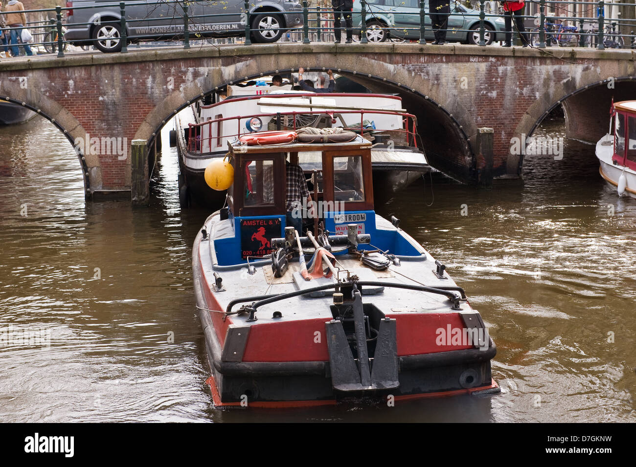 A houseboat being relocated in Amsterdam. Stock Photo