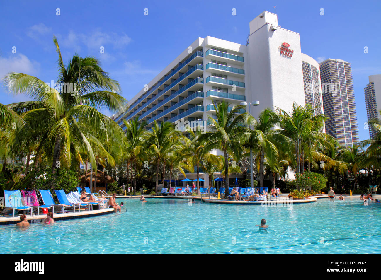 Hollywood Florida,water,Crowne Plaza Hollywood Beach,hotel,swimming pool area,woman female women,palm trees,FL120929143 Stock Photo