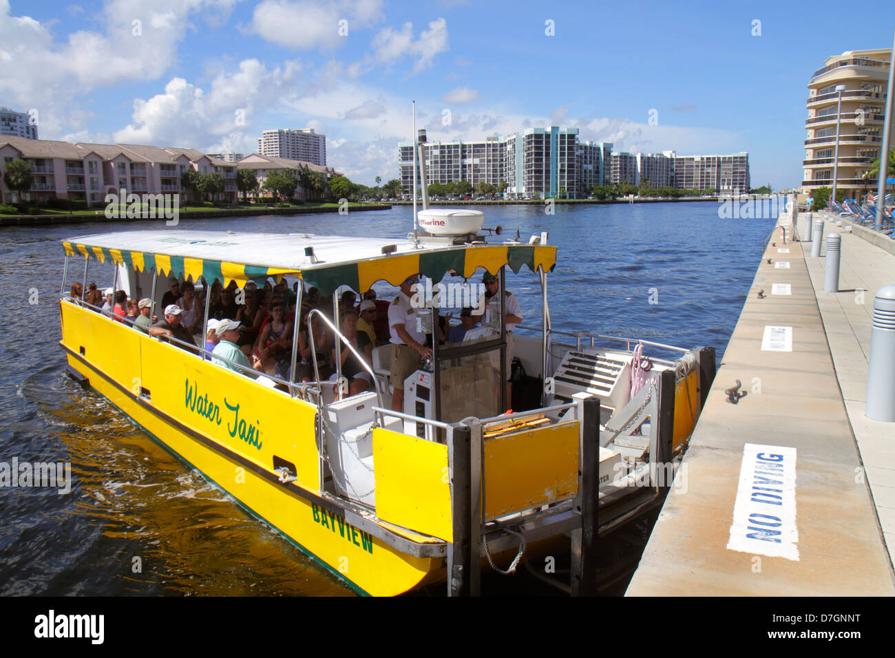 Ft. Fort Lauderdale Florida,Intracoastal The Water taxi,taxis,boat,Crowne Plaza Hollywood Beach,hotel,stop,passenger passengers rider riders,man men m Stock Photo