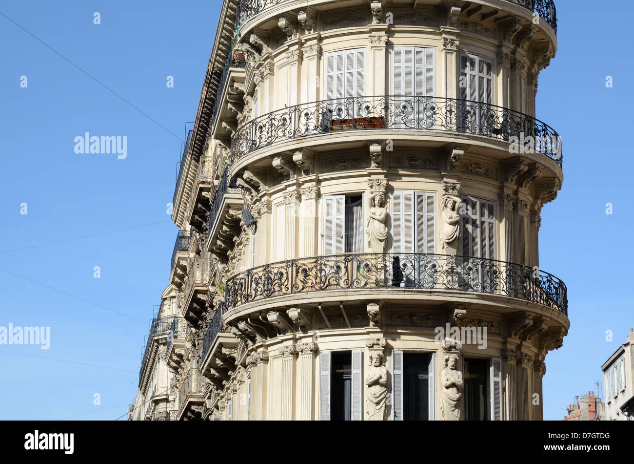 Belle Epoque Apartments in Historic Corner Building with Art Nouveau Figures, Carytids & Ironwork Balustrades La Canebière Marseille Provence France Stock Photo
