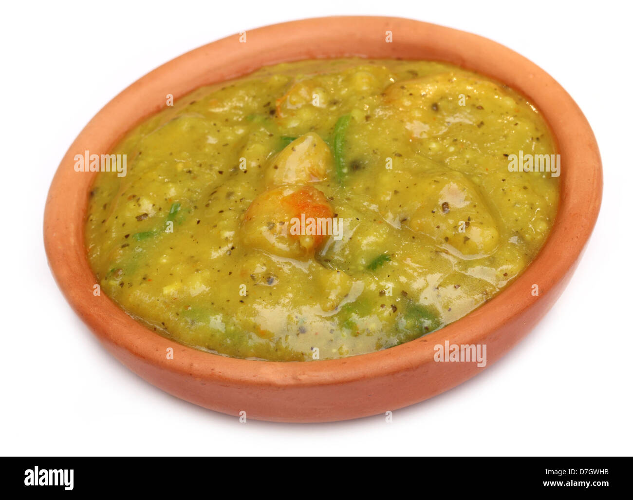 Bengali cuisine – Mashkalai dal with shrimp on a clay pottery Stock Photo