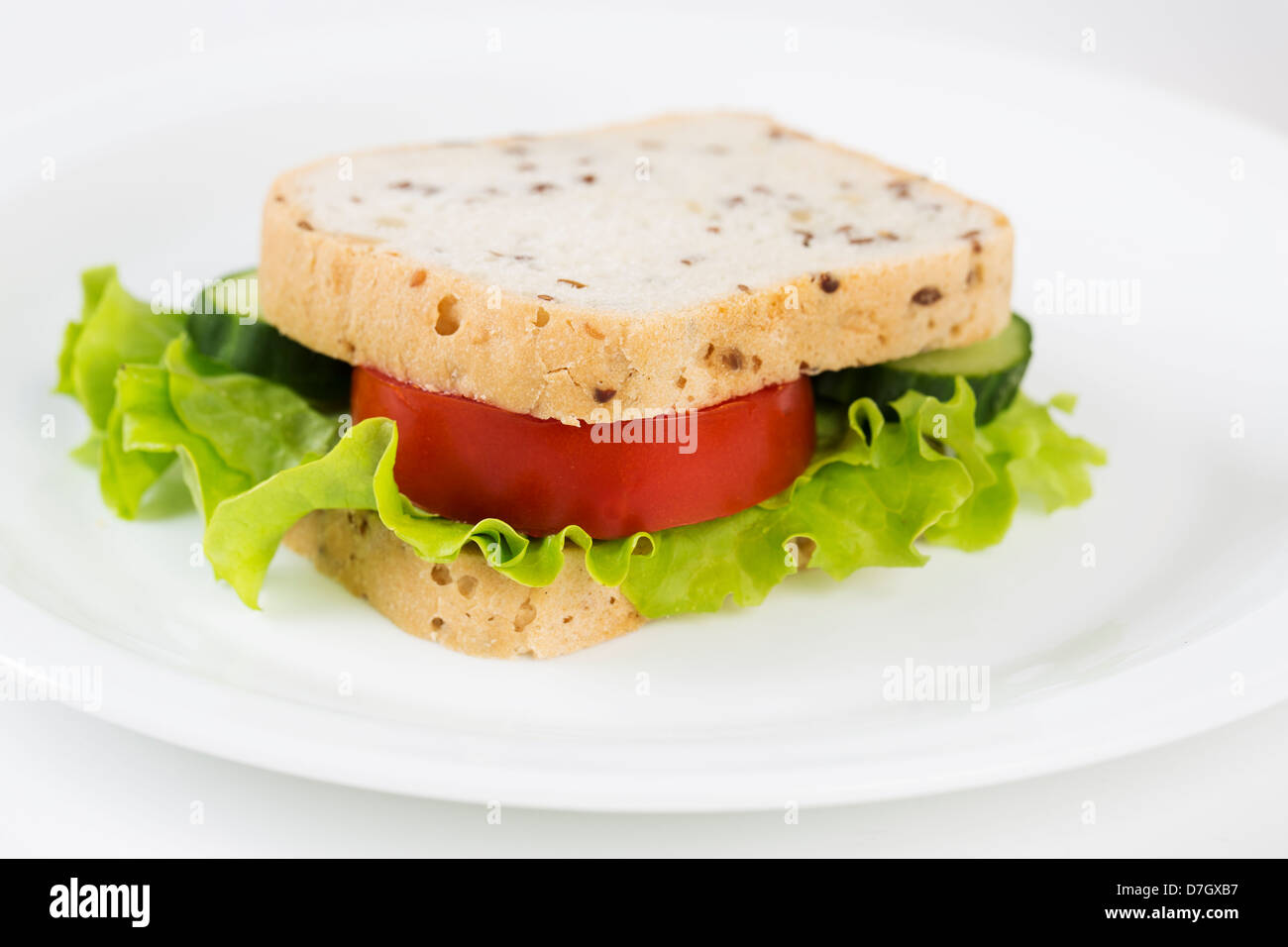 Zoomed sandwich with vegetables will satisfy hungry stomach Stock Photo
