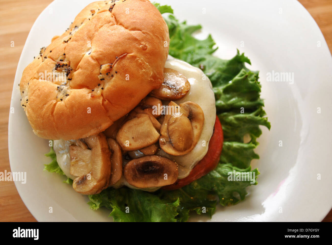 Mushroom Cheeseburger on an Onion Bun Stock Photo Alamy