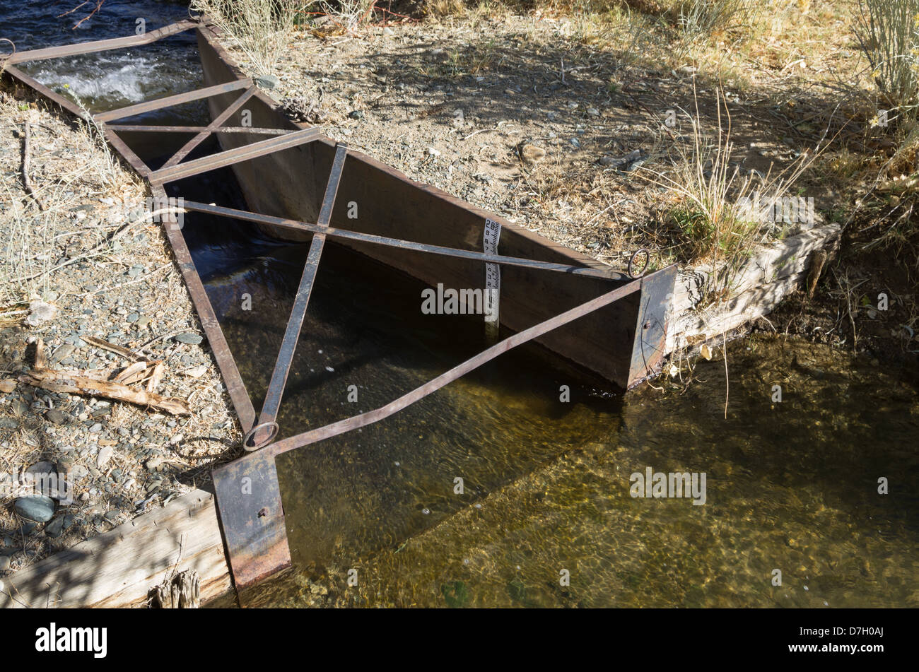metal irrigation ditch control structure with depth gauge Stock Photo