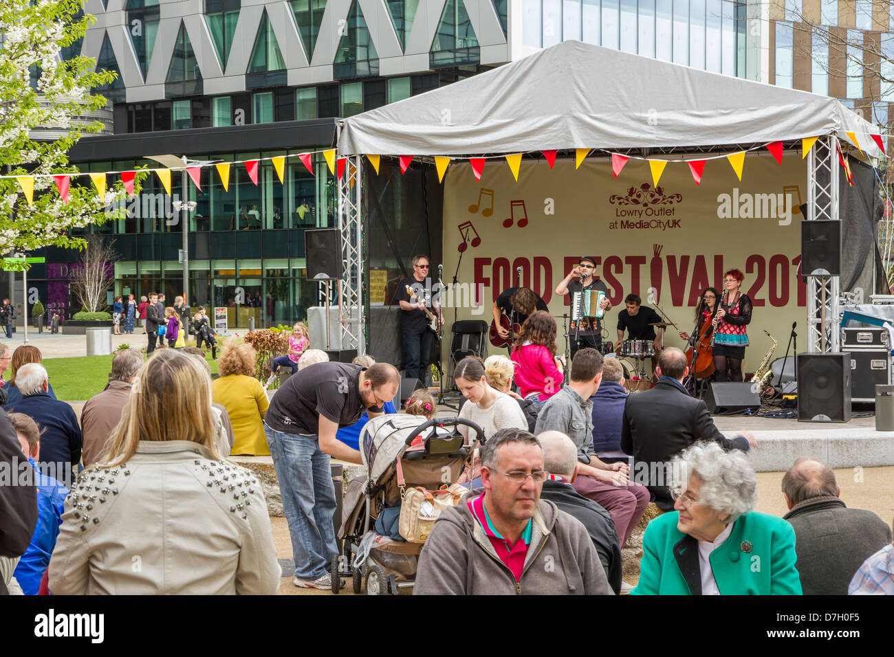 Salford, UK. 5th May 2013. Folk band Lazlo Baby perform at the first ever Lowry Outlet Food Festival 2013 at MediaCity in Salford Quays. Credit: Andrew Barker/Alamy Live News Stock Photo