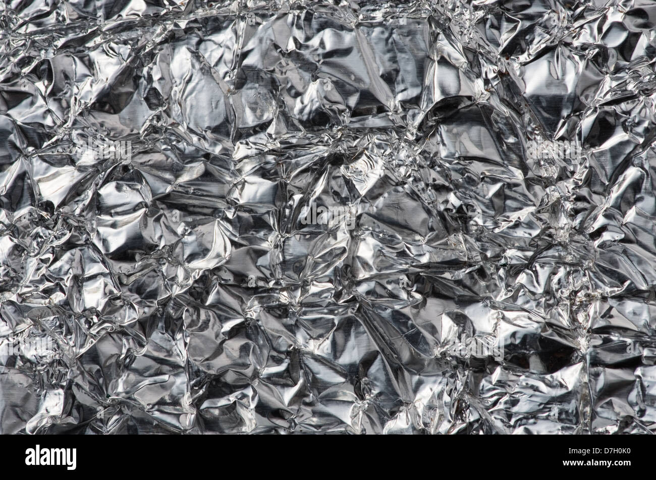 close up crumpled aluminum foil background texture Stock Photo