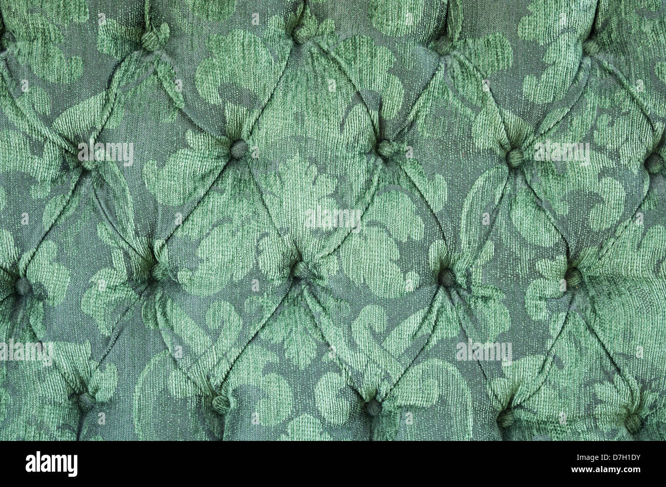 green patterned velvet upholstery for background texture Stock Photo