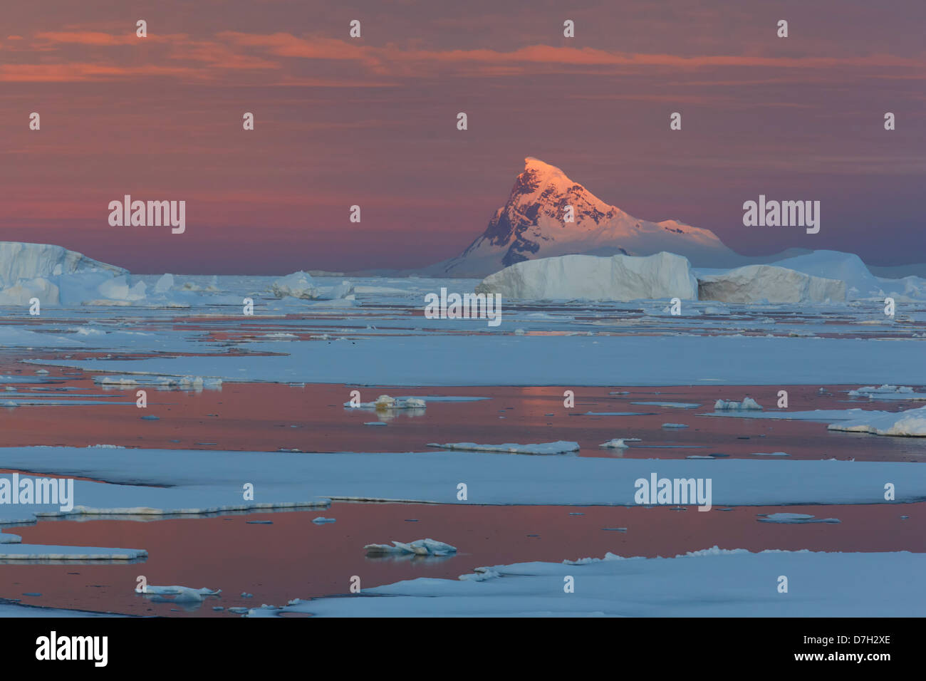Sunset / sunrise as we travel below the Antarctic Circle, Antarctica.  Stock Photo