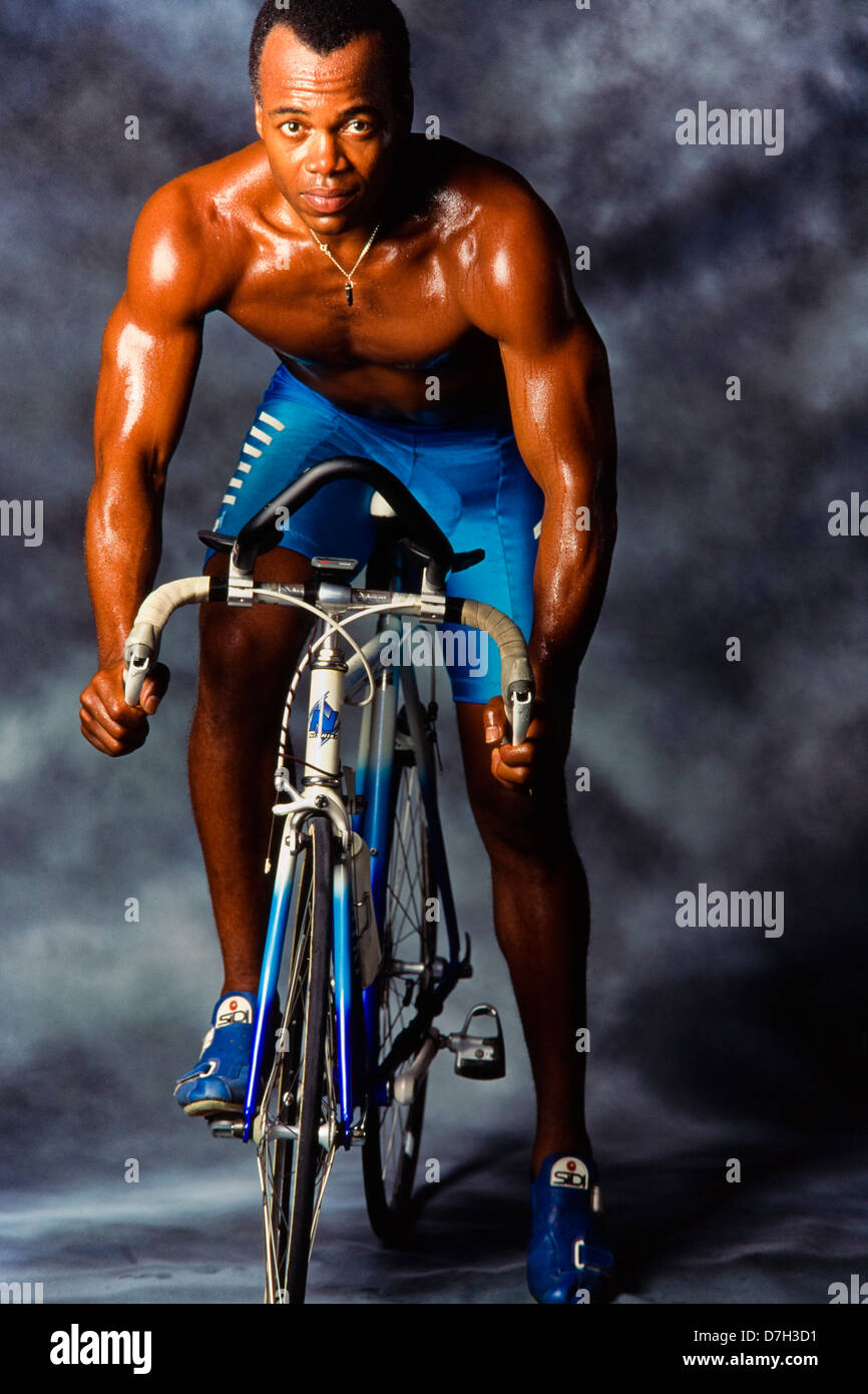Black male cyclist, in studio shot Stock Photo