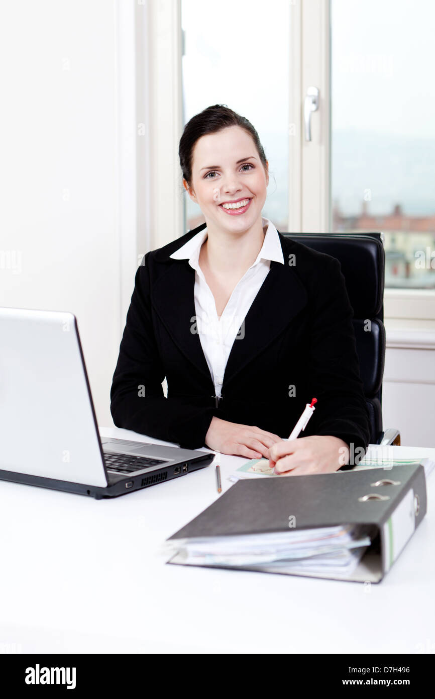 young successful business woman working on computer in office Stock ...