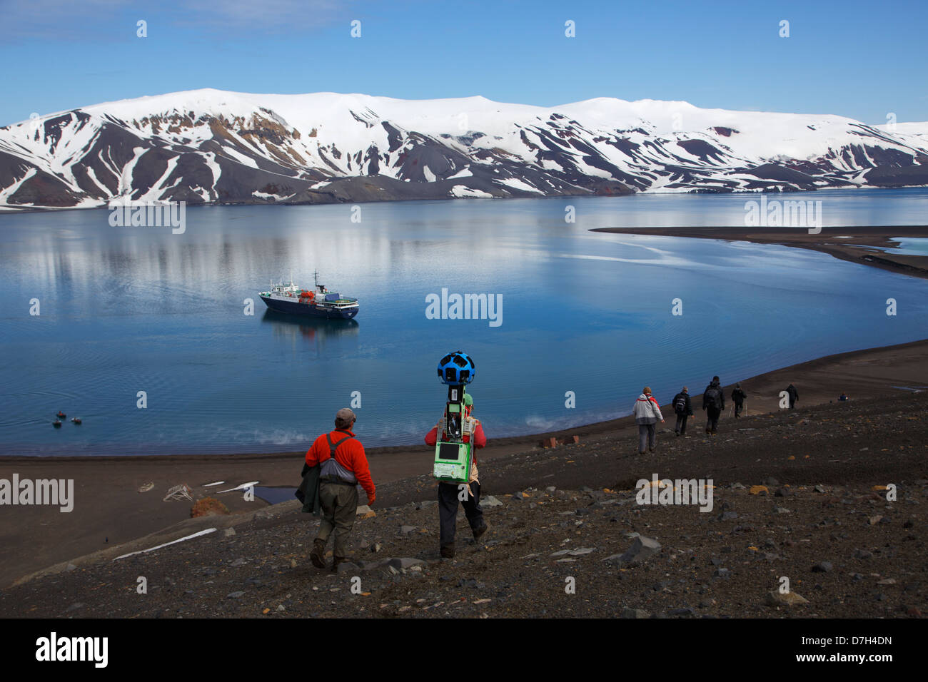 Visitors on the hike from Baily Head to Whaler's Bay, Deception Island, Antarctica.  Stock Photo