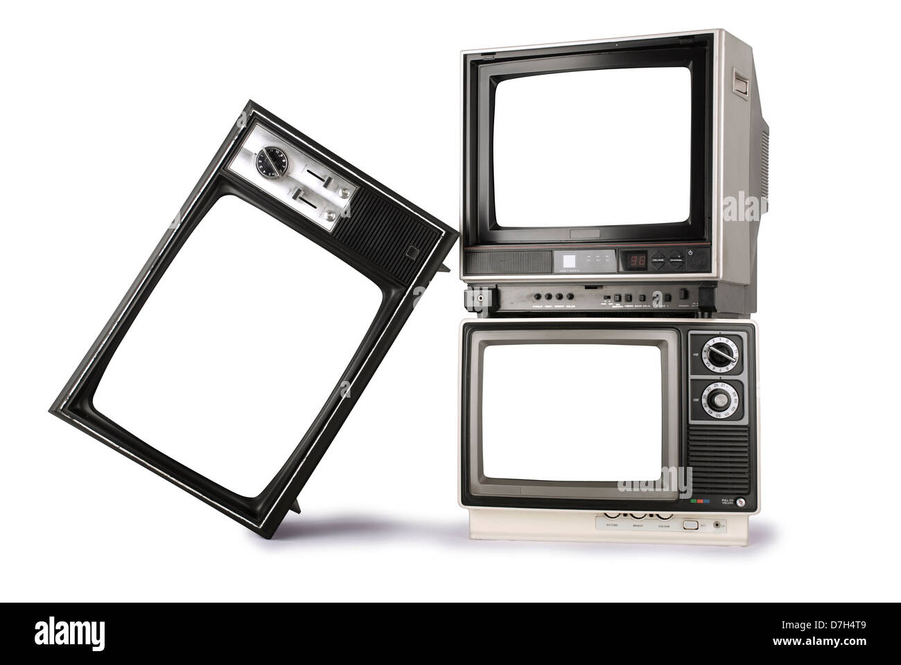 3 stacked retro televisions with blank screens on white background Stock Photo