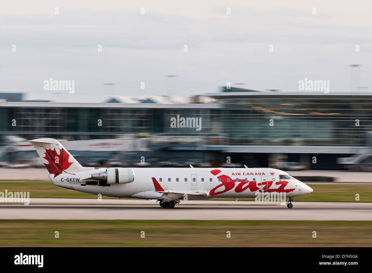 An Air Canada Jazz CRJ200LR regional jet landing Stock Photo Alamy