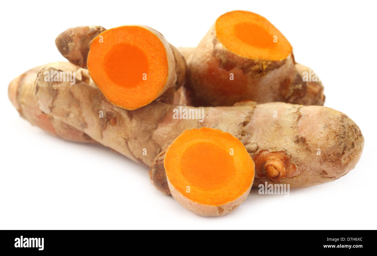 Raw Turmeric over white background Stock Photo - Alamy
