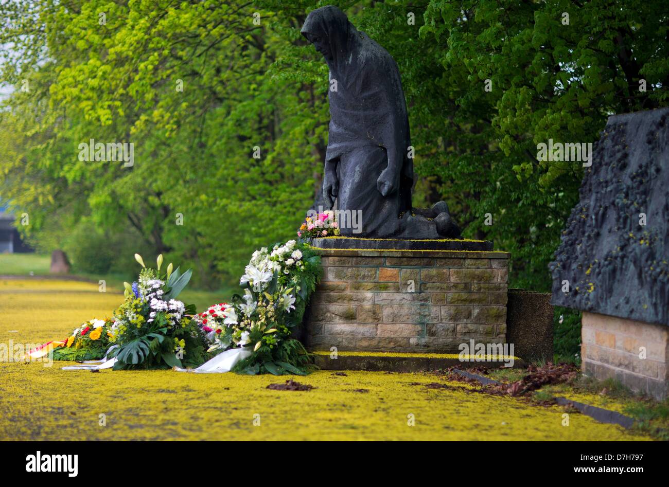Wreaths are laid down at the memorial 'The Mother' to commemorate the end of World War II on 08 May 1945, in Raben-Steinfeld, Germany, 08 May 2013. Mecklenburg-Western Pomerania is the only German state which commits this day as official Remembrance Day. Photo: JENS BUETTNER Stock Photo