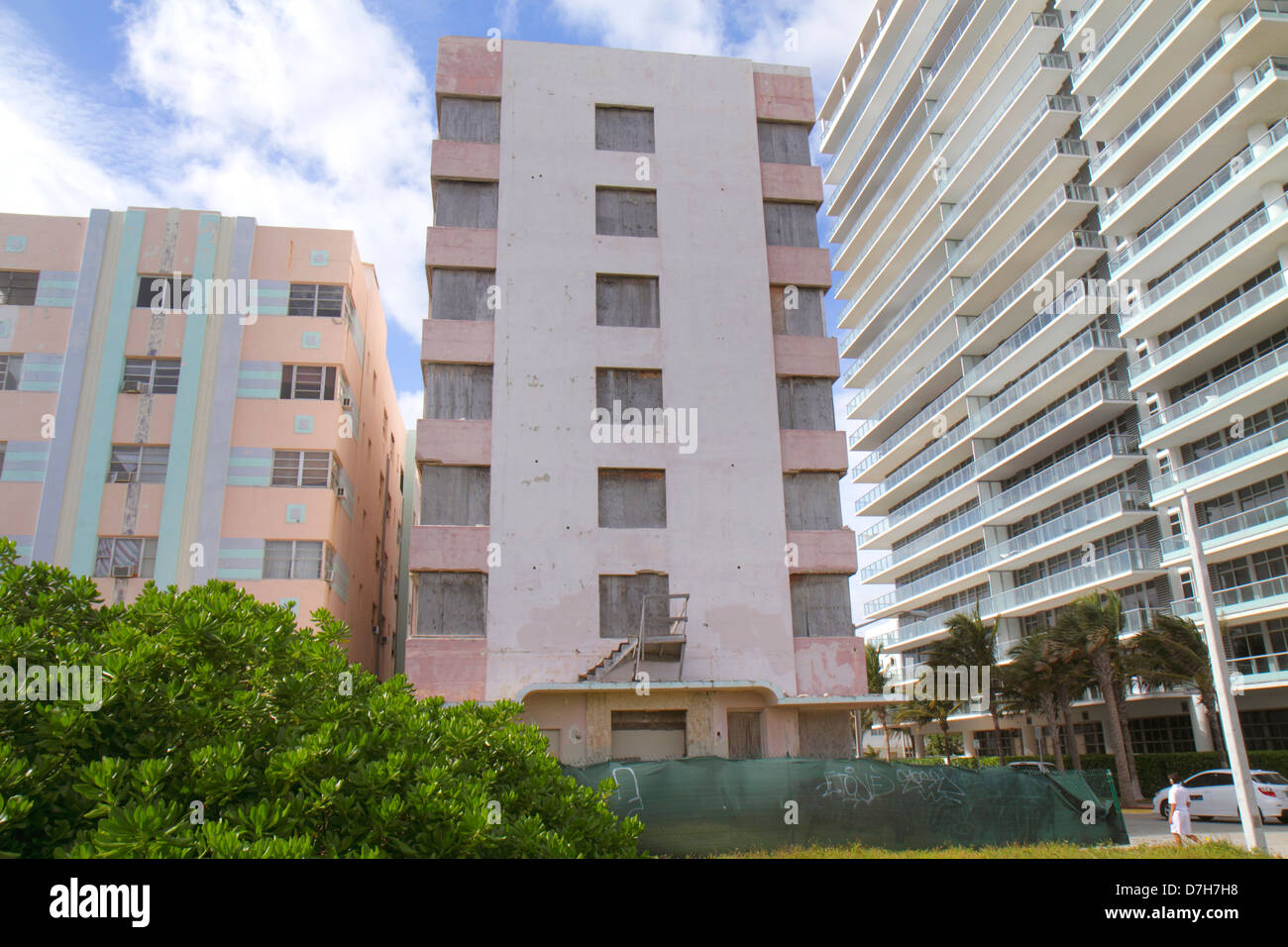 Miami Beach Florida,Collins Avenue,hotel,closed,shuttered,vacant,disrepair,newer,high rise skyscraper skyscrapers building buildings condominium resid Stock Photo