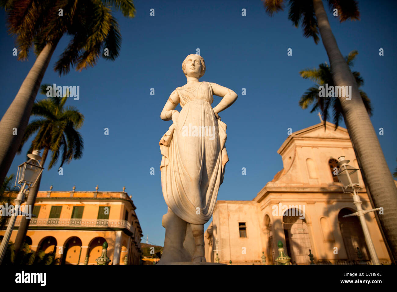 statue in front of the cathedral on the square Plaza Mayor in Trinidad, Cuba, Caribbean Stock Photo