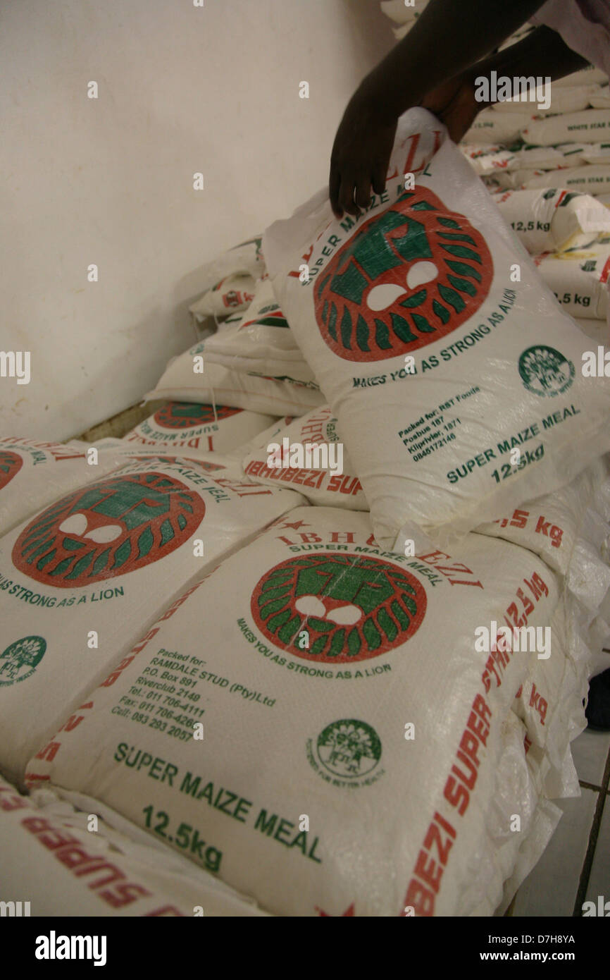 12.5Kg bags of maize meal for sale in a general dealer shop Stock Photo