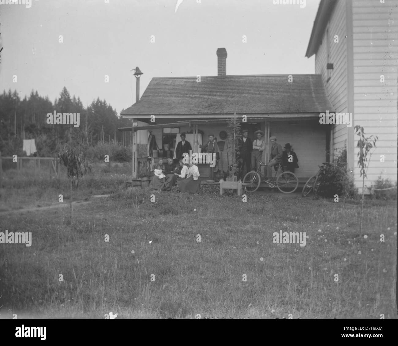 Back porch of house and people Stock Photo Alamy