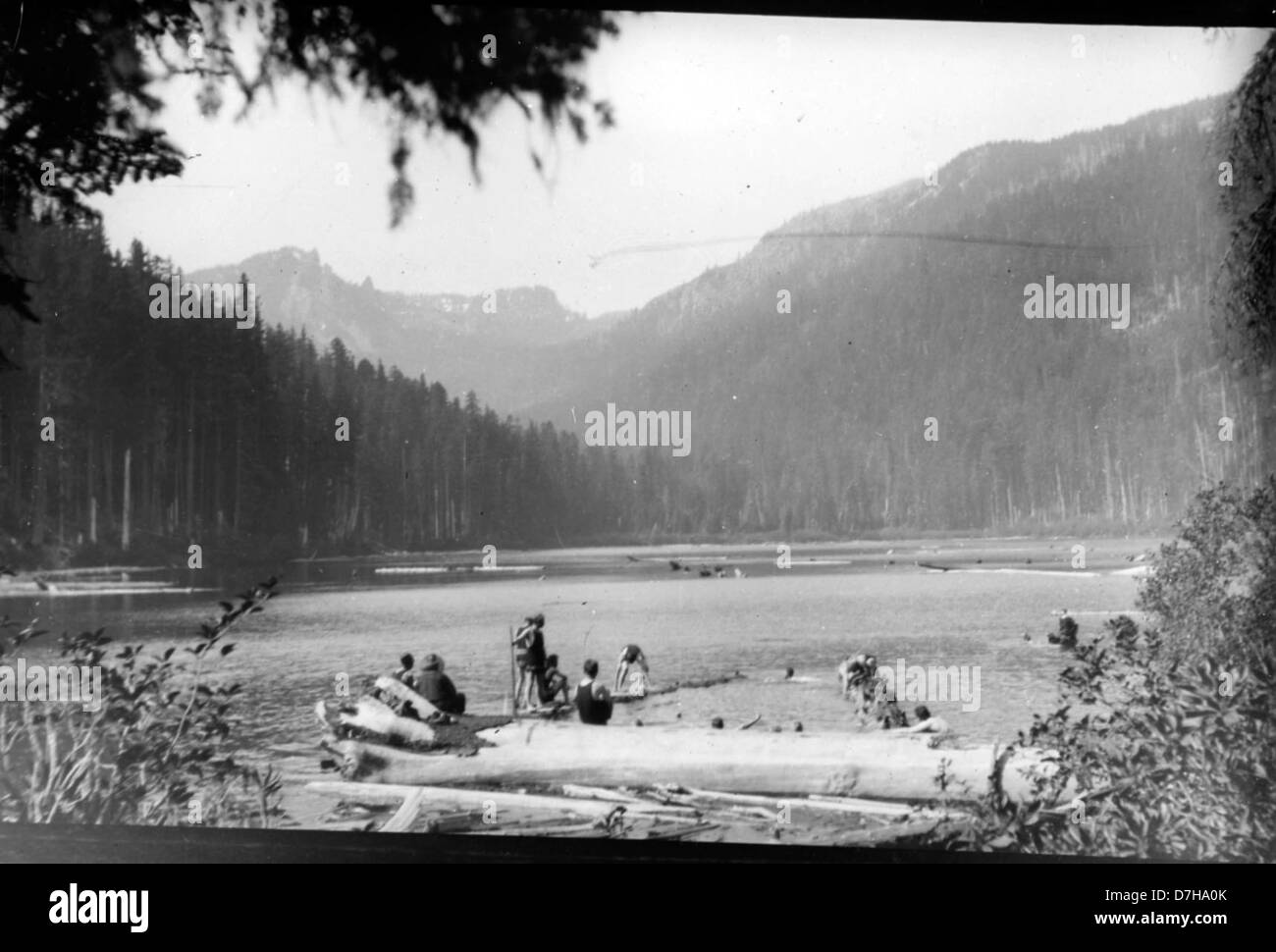 Photograph depicting people swimming in Pamelia Lake, captured by Herman Bohlman and housed in the OSU Archives. The image reflects a recreational scene set in nature, emphasizing human activity in a natural environment. Stock Photo