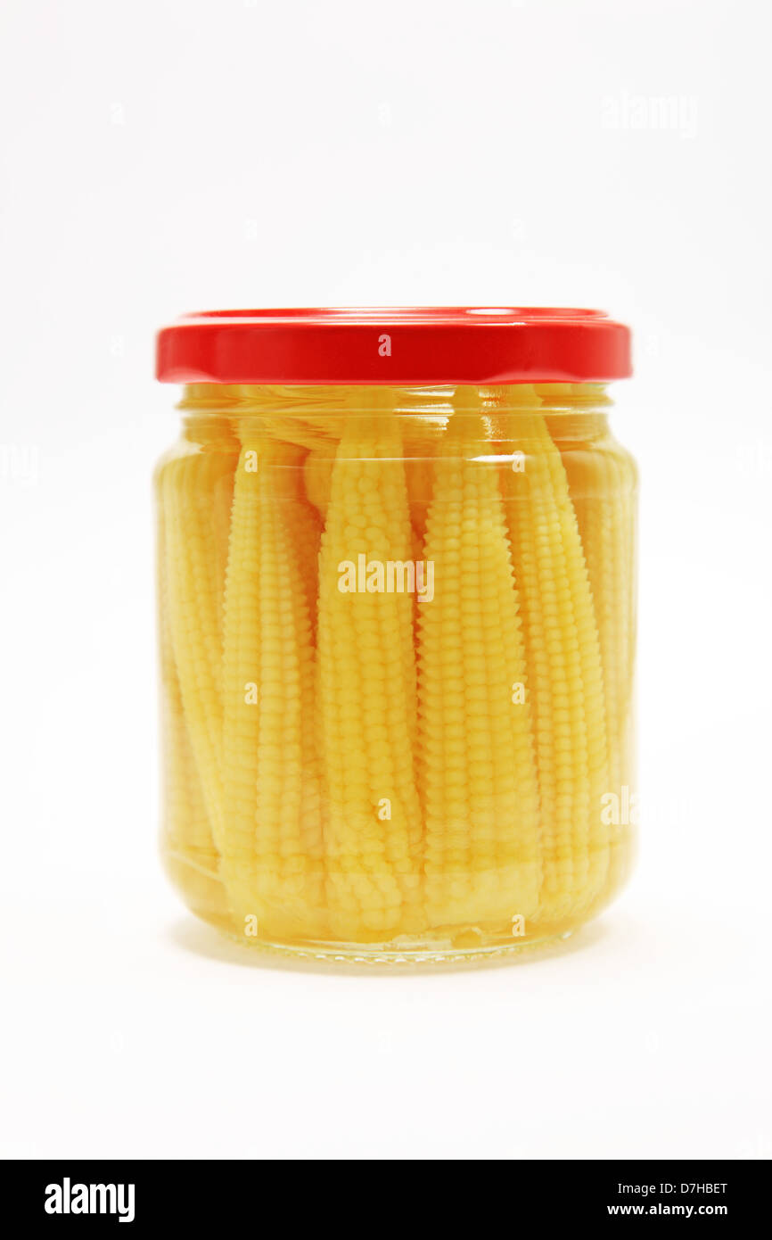 Pickled baby corns in glass jar Stock Photo