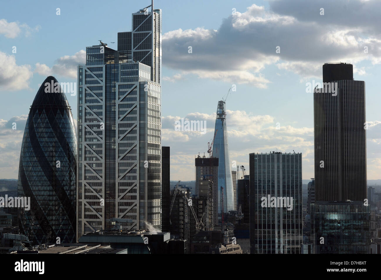 General view of The Swiss Re Building (L), better known as The Gherkin, the Heron Tower (1st left The Shard and Tower 42 (R) Stock Photo