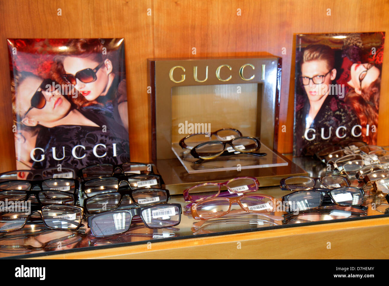 Miami Beach Florida,optometrist's office,sunglasses,eyeglasses,well dressed,frames,retail display case sale,Gucci,designer,FL121231098 Stock Photo
