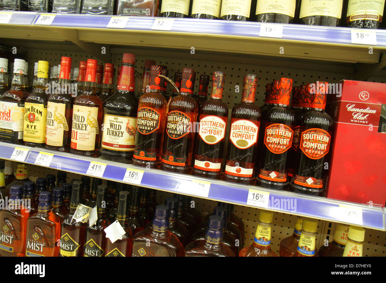 Miami Beach Florida,Walgreens,liquor store,shelf shelves,retail display case sale,prices,bottles,alcoholic drink drinks,Southern Comfort,Wild Turkey,b Stock Photo