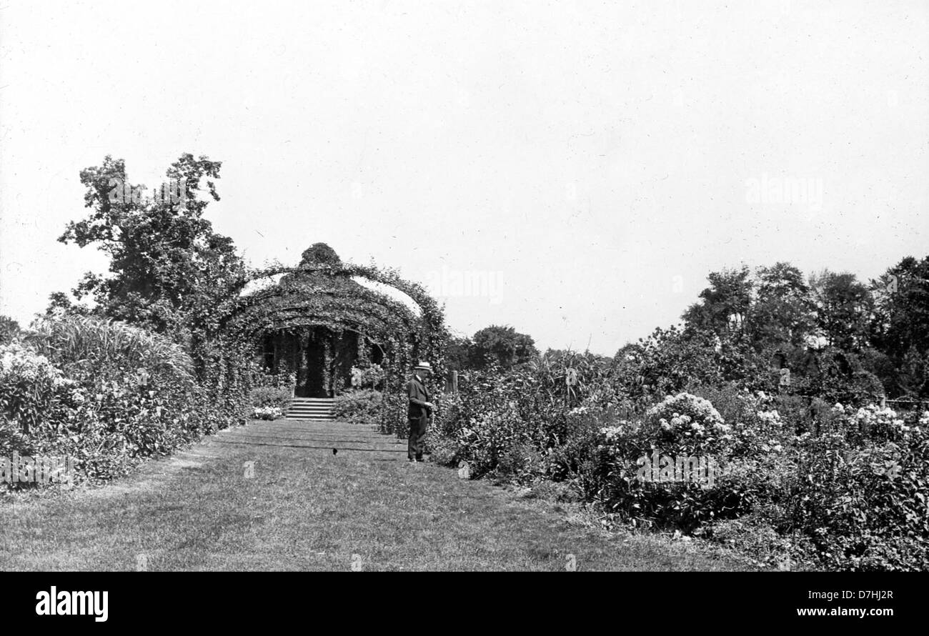 A photograph of the Rose Garden at Elizabeth Park in Hartford, Connecticut, showcasing the vibrant blooms and well-maintained landscape, a popular site for visitors and flower enthusiasts. Stock Photo