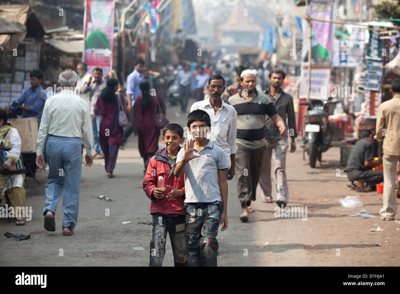 Two young boys in a street in Mumbai, India Stock Photo