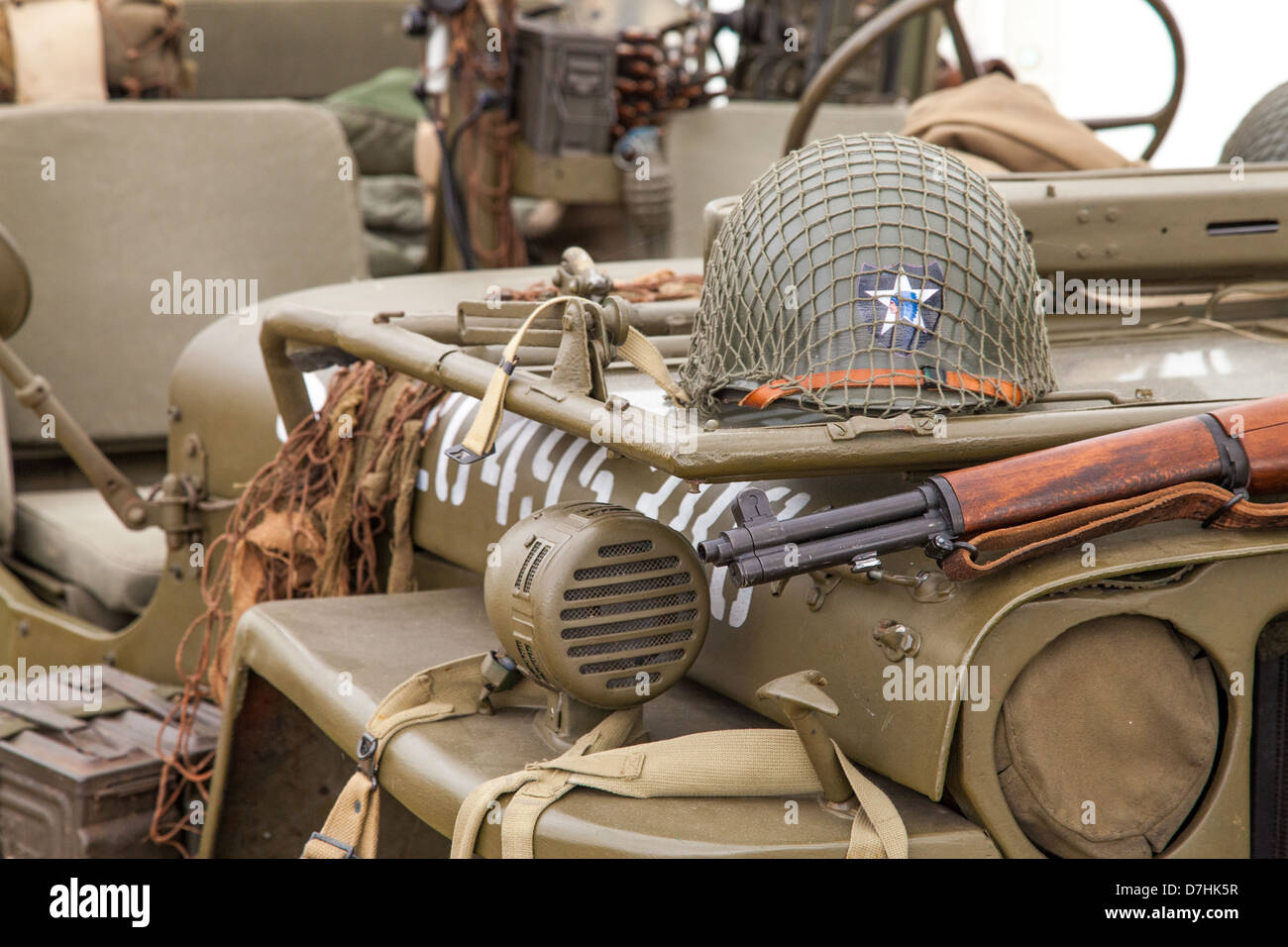 American WW2 Jeep with helmet and rifle (re-enactment, deactivated) Stock Photo