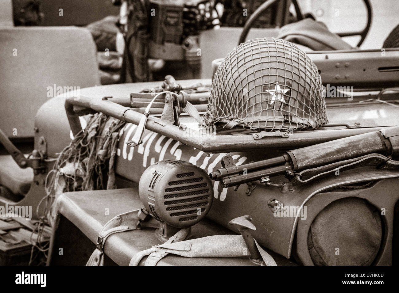American WW2 Jeep with helmet and rifle (re-enactment, deactivated) Stock Photo
