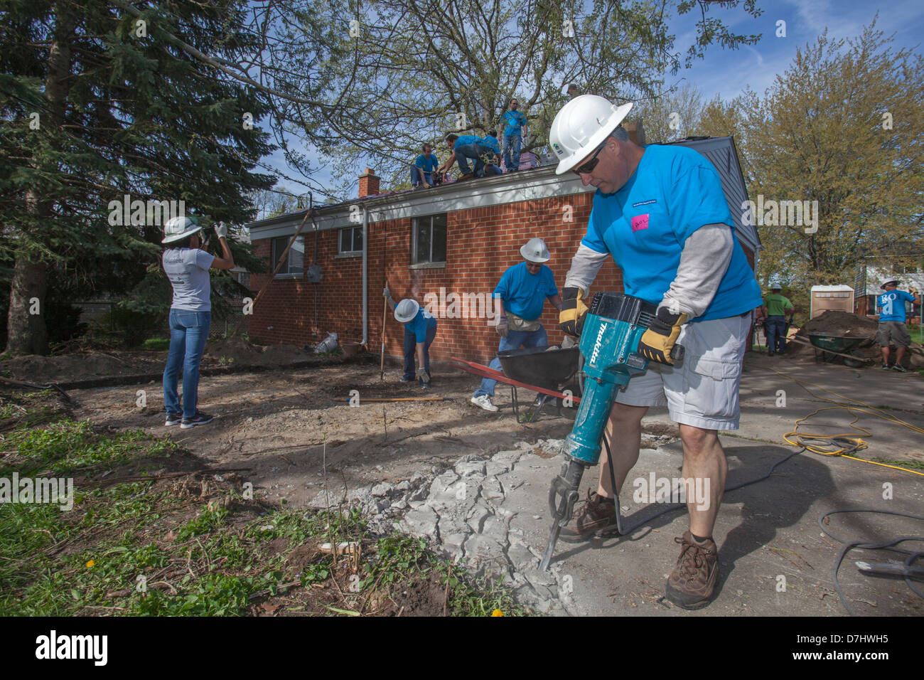 Volunteers Rehabilitate a House for Habitat for Humanity Stock Photo