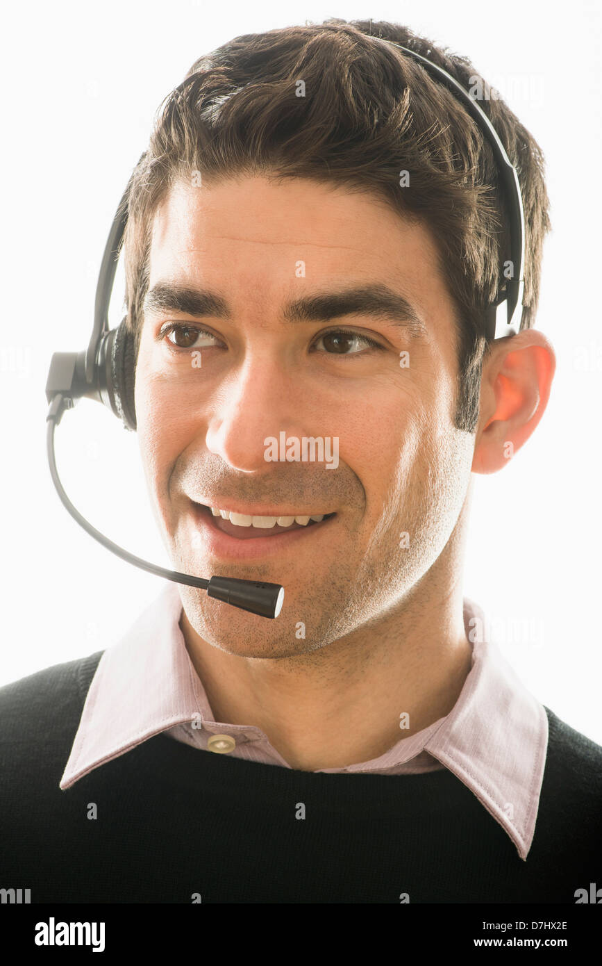 Studio portrait of man wearing headset Stock Photo Alamy