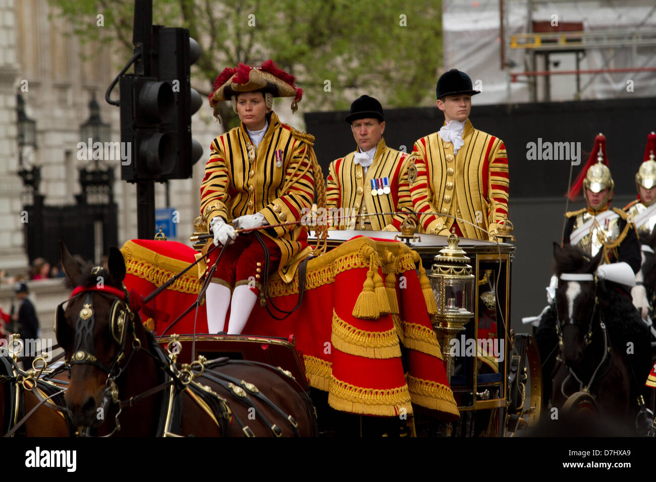 Westminster London, UK. 8th May 2013.  The Queen arrives in a carriage to open a new session of Parliament at the House of Lords with a speech to outline the government's 19 draft bills. Credit: Amer Ghazzal/Alamy Live News Stock Photo