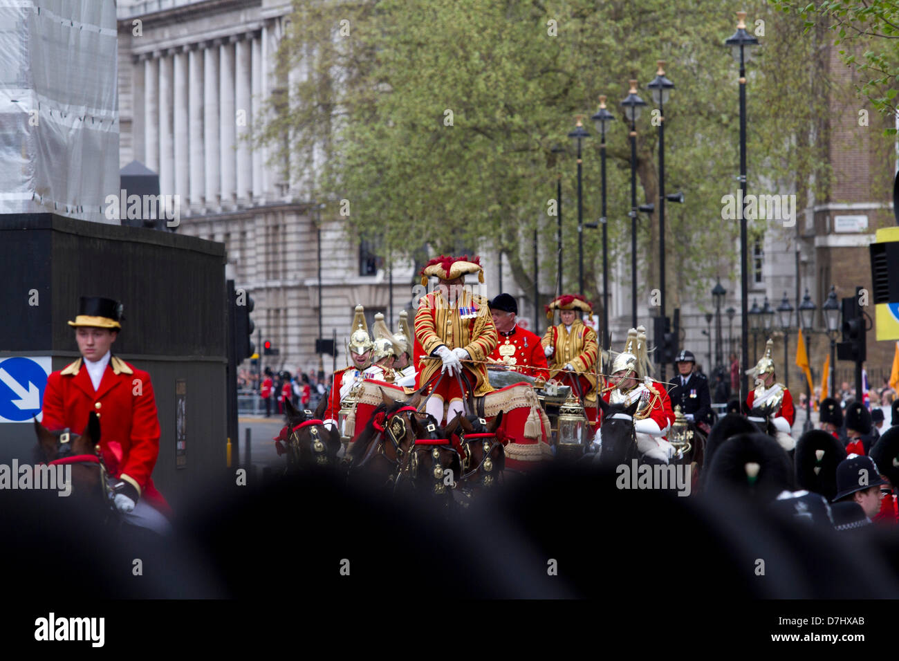 Westminster London, UK. 8th May 2013.  The Queen arrives in a carriage to open a new session of Parliament at the House of Lords with a speech to outline the government's 19 draft bills. Credit: Amer Ghazzal/Alamy Live News Stock Photo