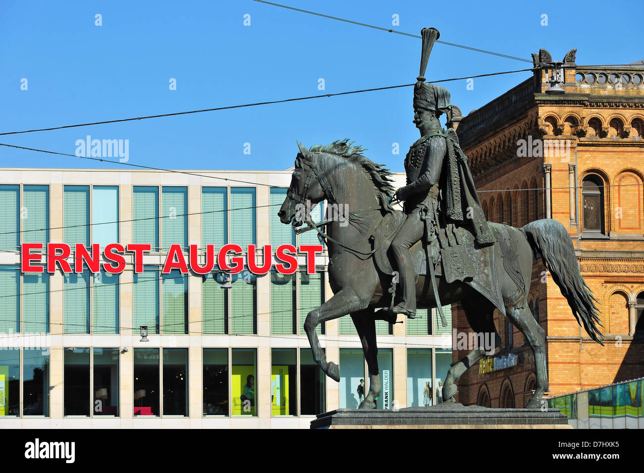 The Ernst-August-rider memorial in front of the main railway station in Hanover, in the background the new Ernst-August-Galerie Stock Photo