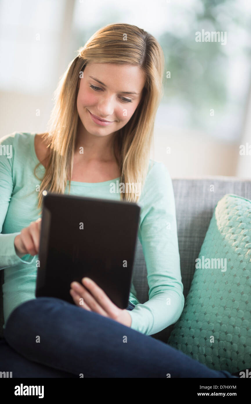 Woman using tablet pc Stock Photo
