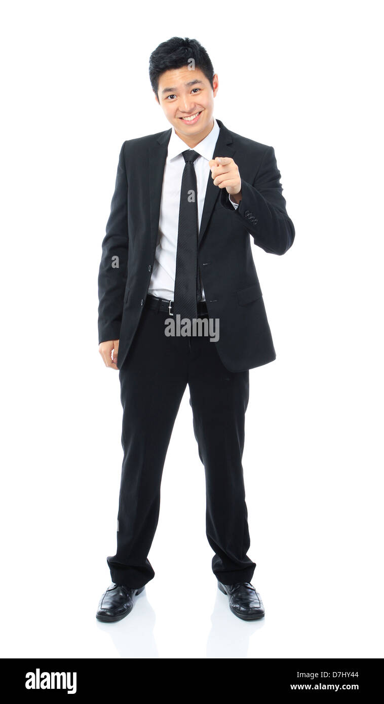 Teenager in formal attire pointing at the camera Stock Photo