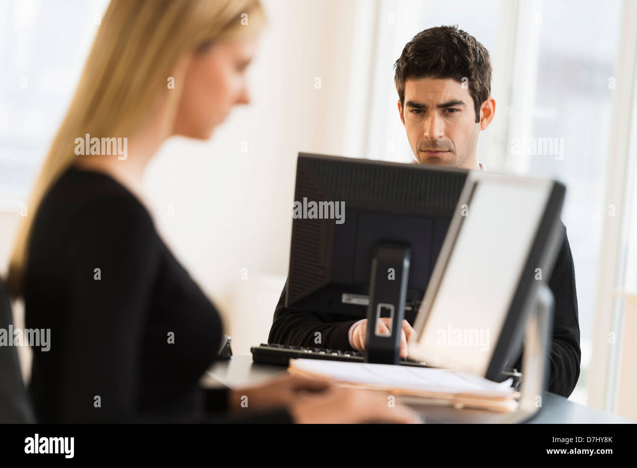 Busy man sitting desk working hi-res stock photography and images - Alamy