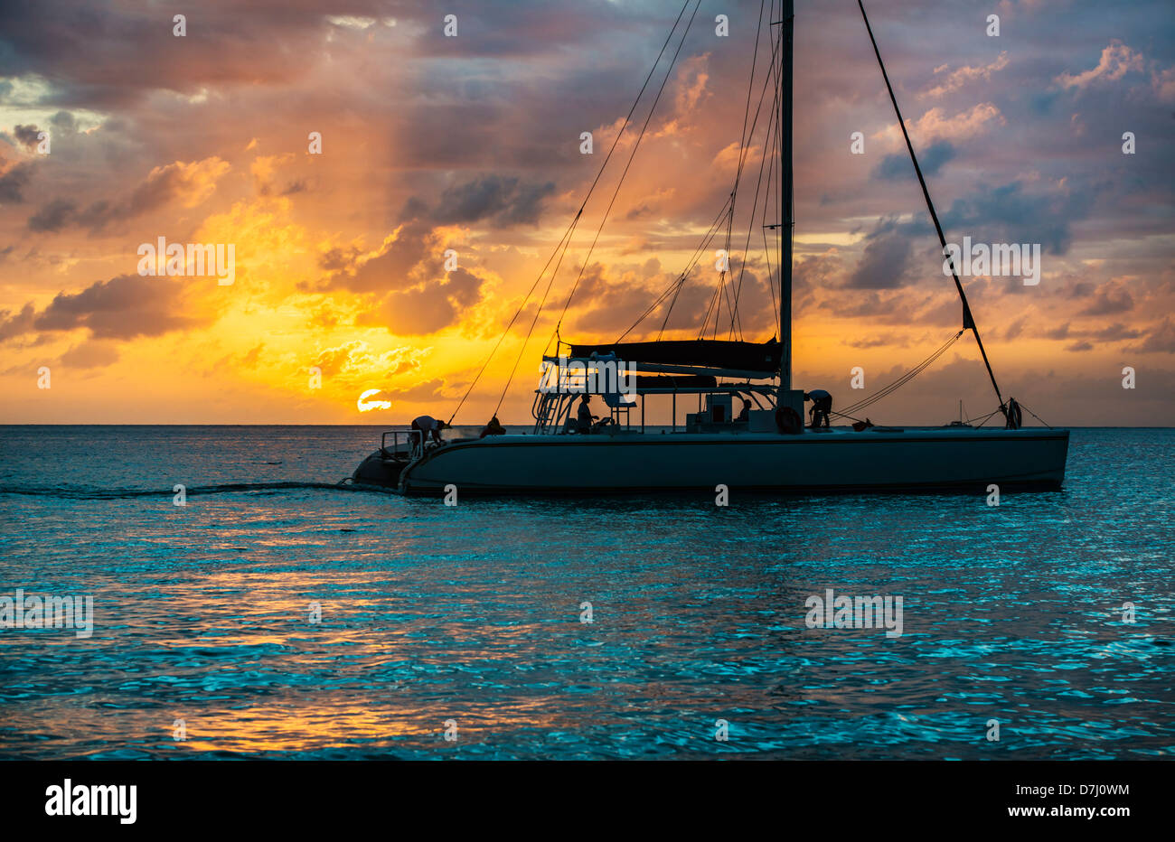 Jamaica, Catamaran on sea at sunset Stock Photo