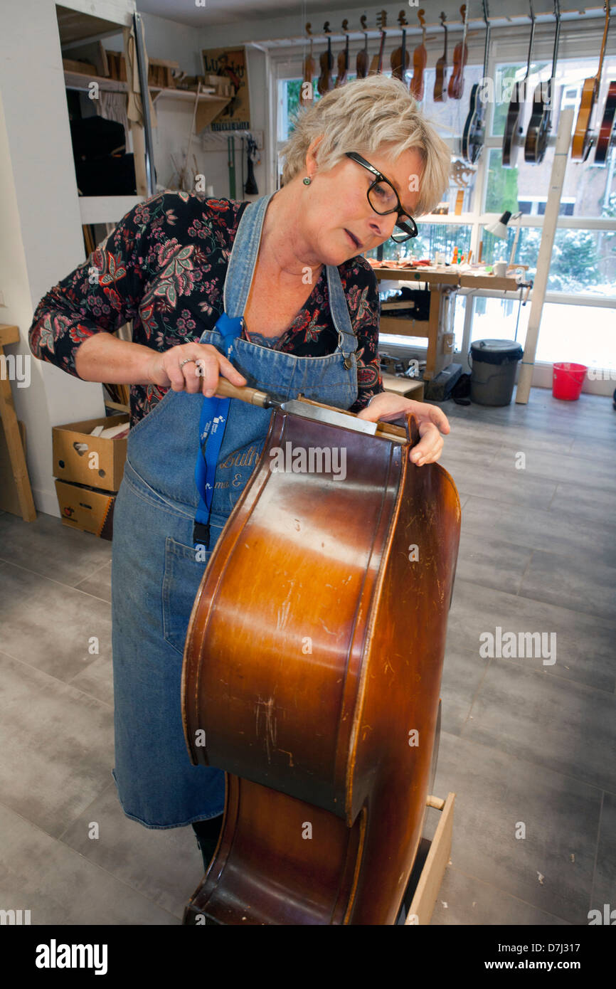 music instrument repair shop in Holland Stock Photo Alamy