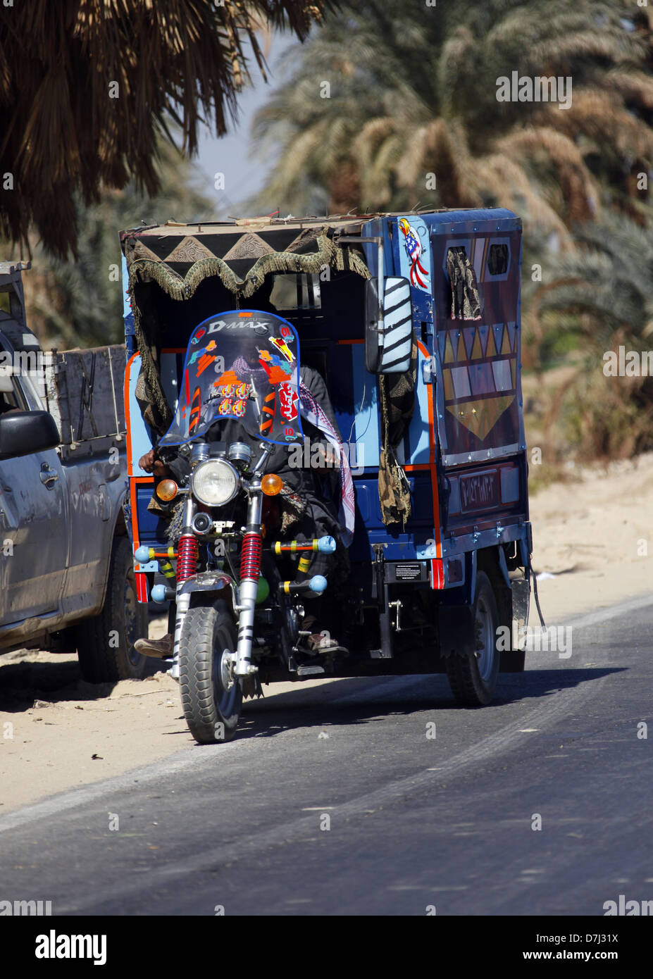 EGYPTIAN BLUE MOTOR TRICYCLE NEAR ASWAN EGYPT 11 January 2013 Stock