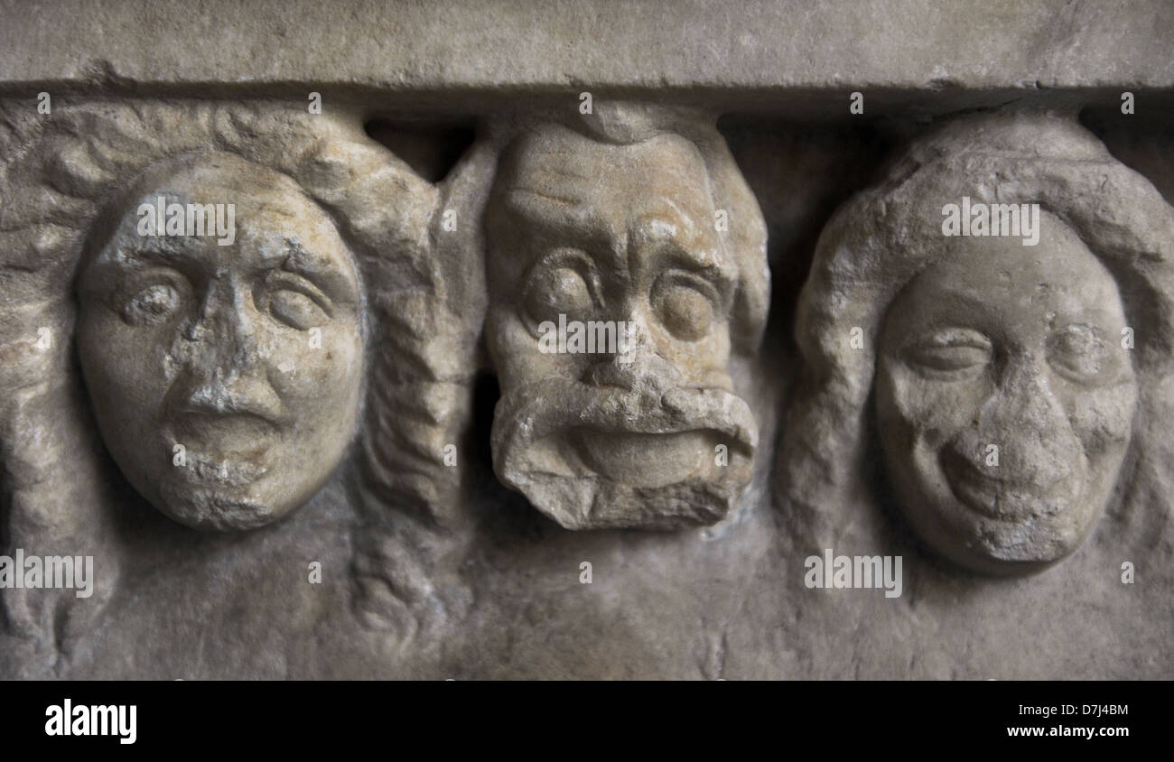 Votive stele depicting a sacrificial procession to Dionysus and Artemis. Votive offering, ca. 360 BC. Detail of the masks. Stock Photo