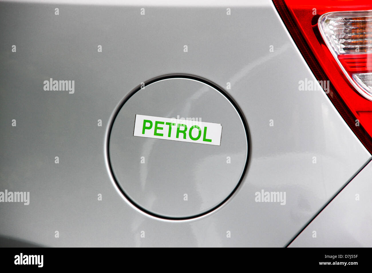 Petrol reminder label on car tank flap Stock Photo