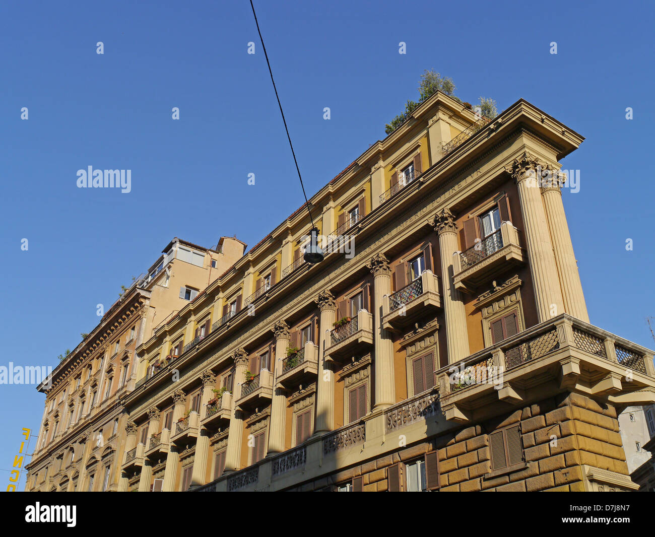 Rome flatiron shaped apartment building Stock Photo