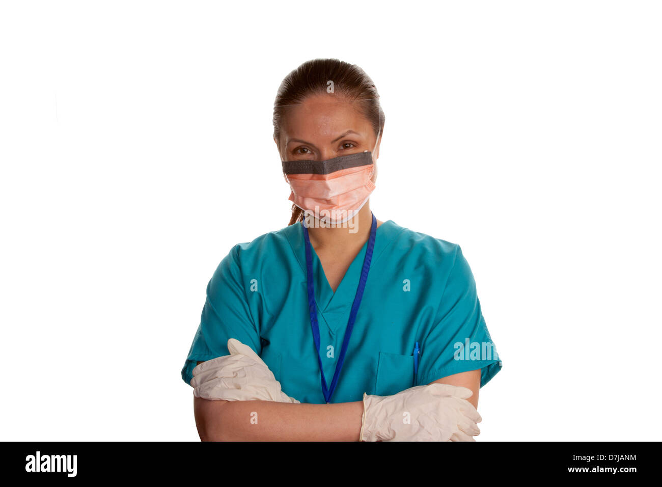 Portrait of a nurse wearing a protective face-mask with eye-shield. Smiling. Stock Photo