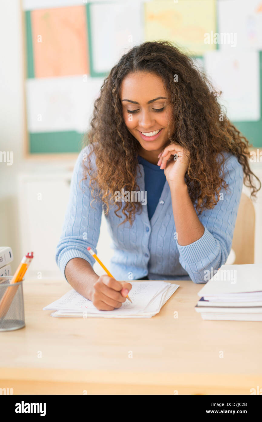 Portrait of elementary school teacher in class Stock Photo