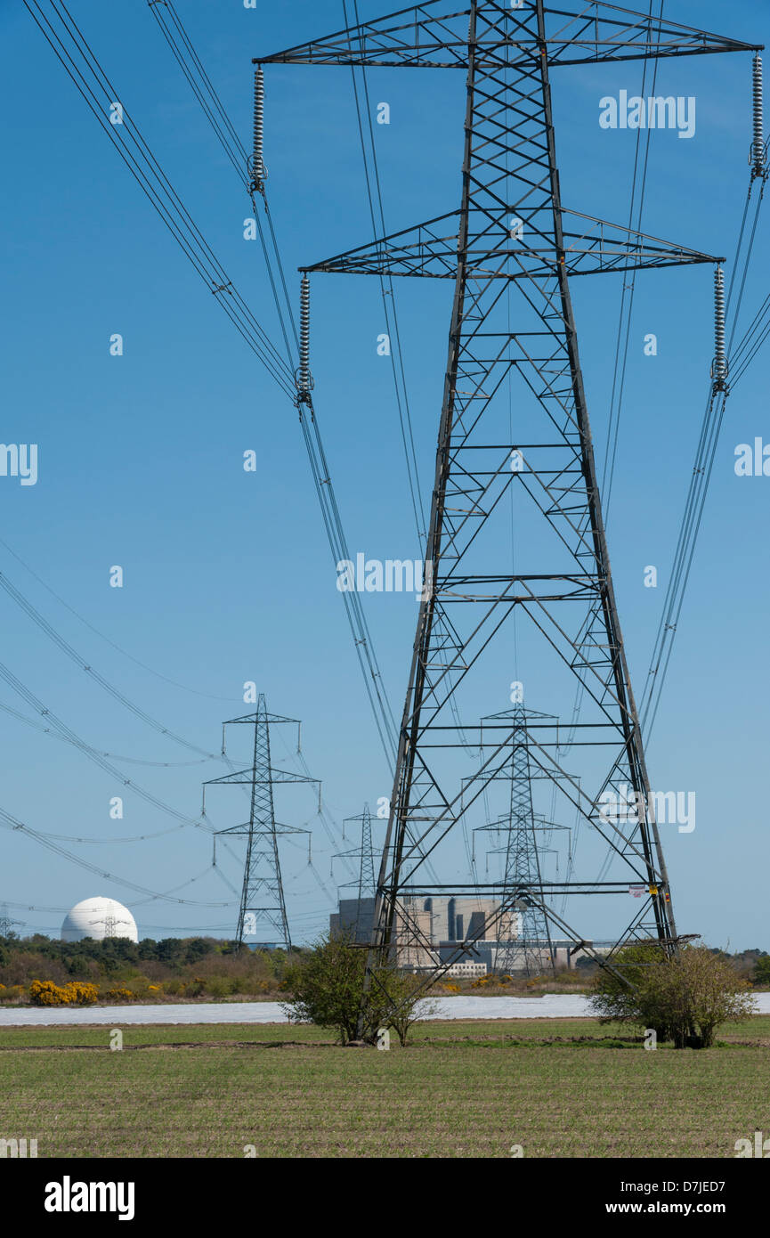 Electricity pylons on farmland at Sizewell nuclear power station Suffolk UK Stock Photo