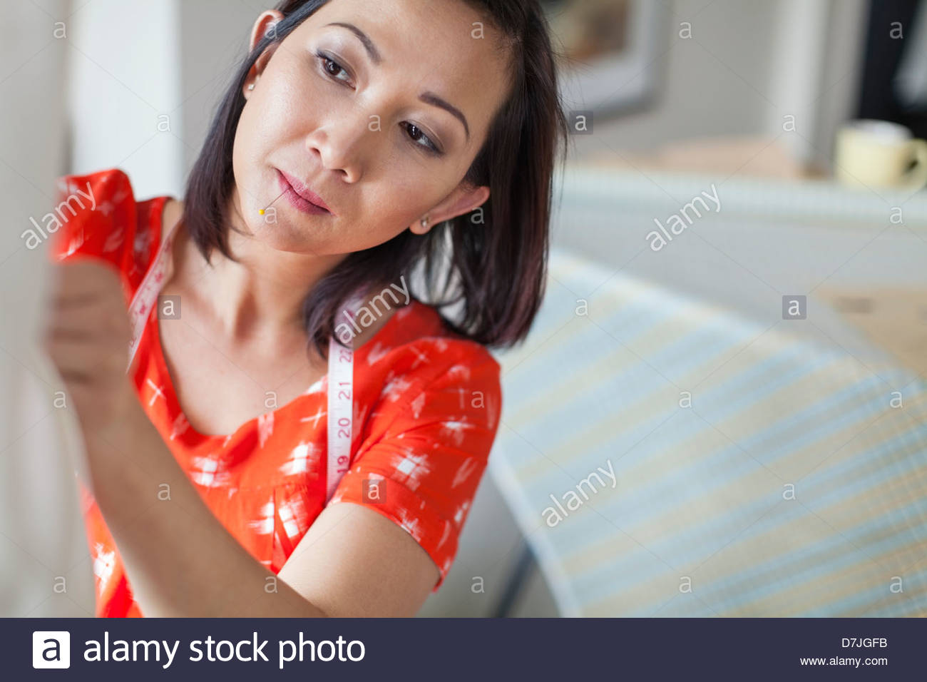 Female seamstress working in home studio Stock Photo Alamy